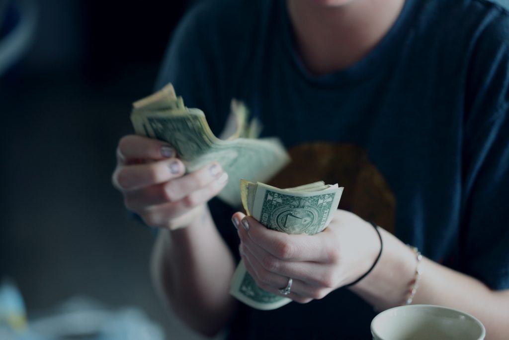 Person sorting money