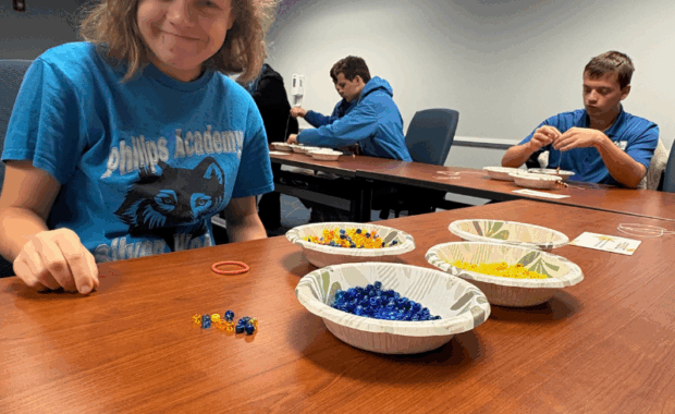 Phillips Academy Student Assembling items.