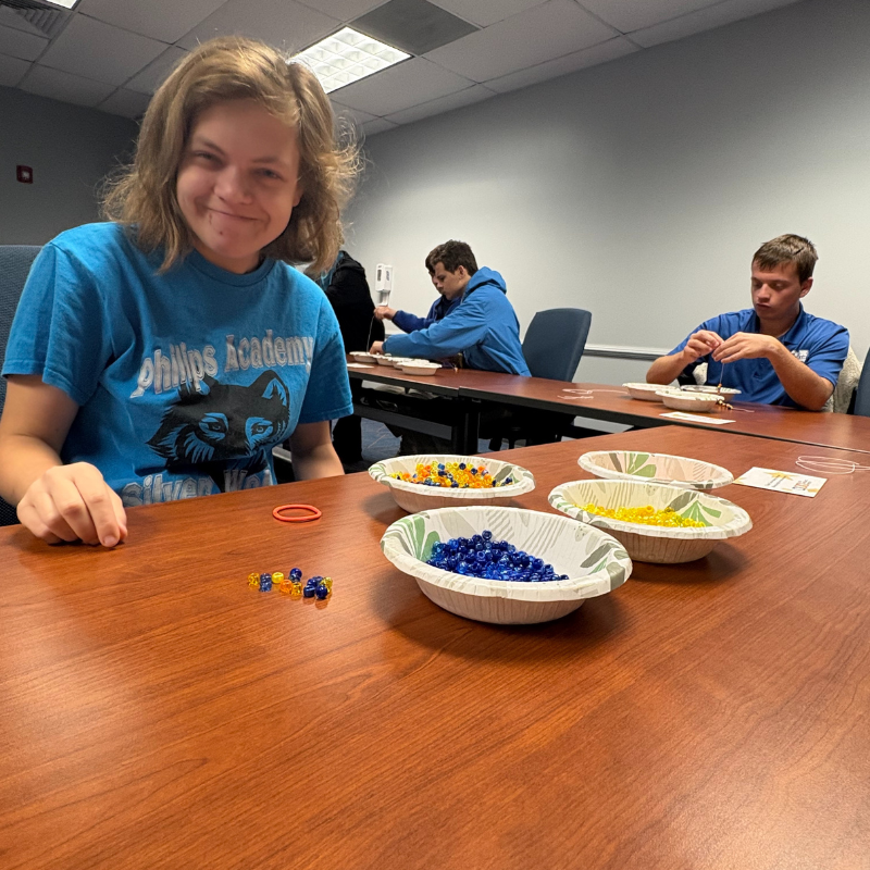 Phillips Academy Student Assembling items.